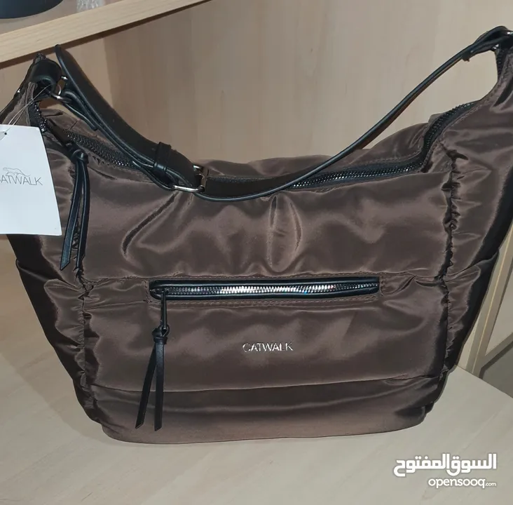حقيبة يد لون بني