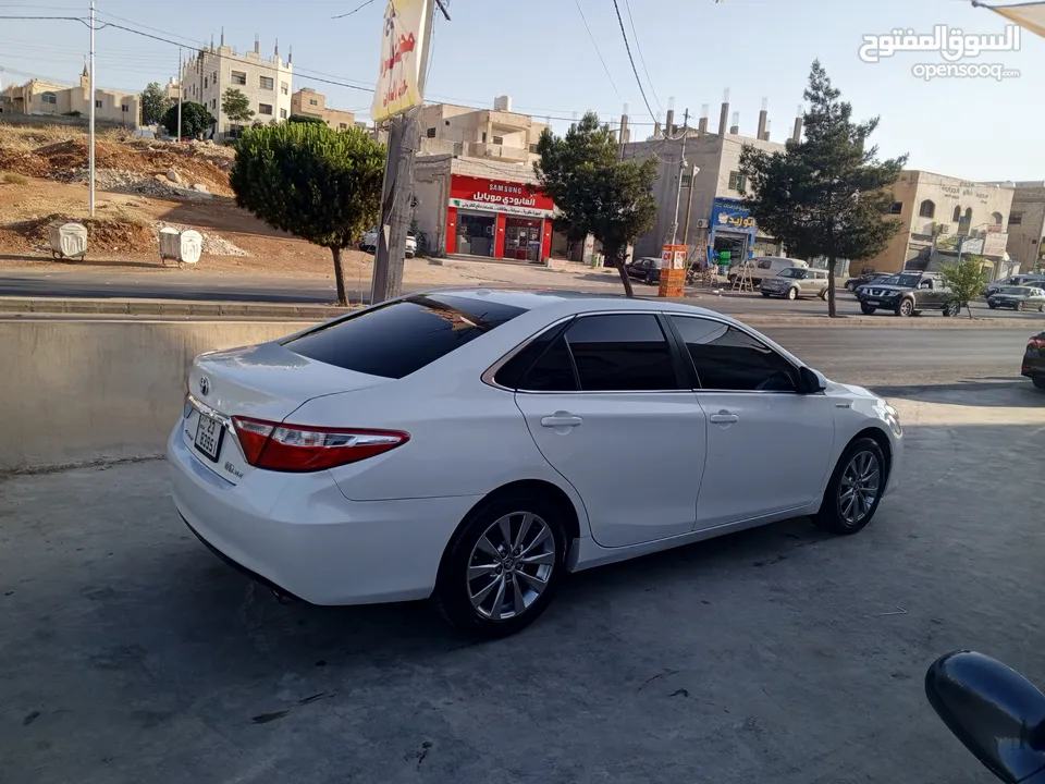 تويوتا كامري هايبرد موديل 2015 فحص كامل أعلى صنف بالاضافات XLE بحالة الوكالة.