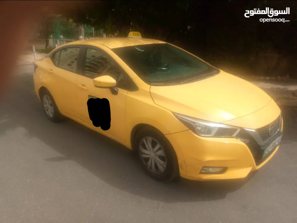 نيسان صني 2021 اتوماتيك تكسي عمان طبعه حره فحص كامل ترخيص لشهر2/2026 طالع من وكالة نيسان قي2021 فحص