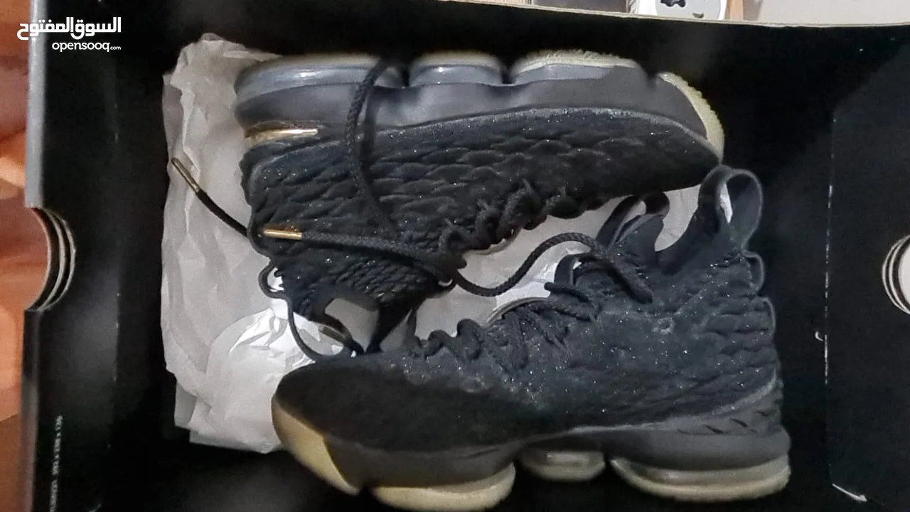 Lebron black and gold basketball shoes