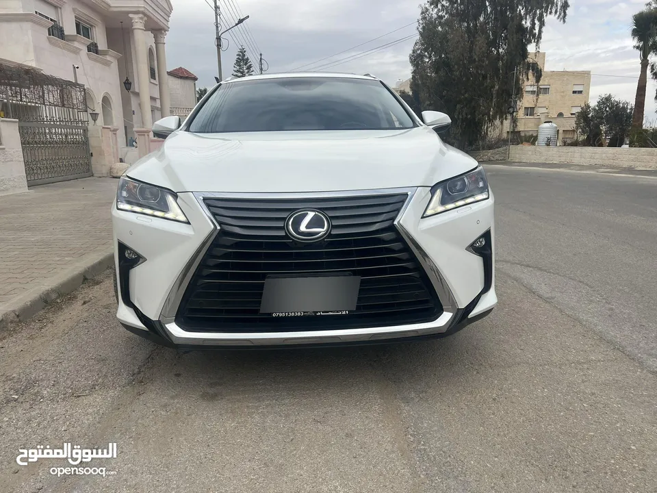 لكزس RX450hL موديل 2018 لون ابيض لؤلؤي وارد وصيانه الوكاله اعلى تصنيف من فئتها