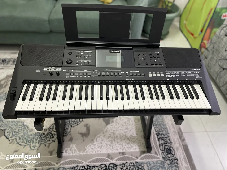 Yamaha PSR- E463 keyboard for sale with strong high quality sturdy metal stand. OMR 90.