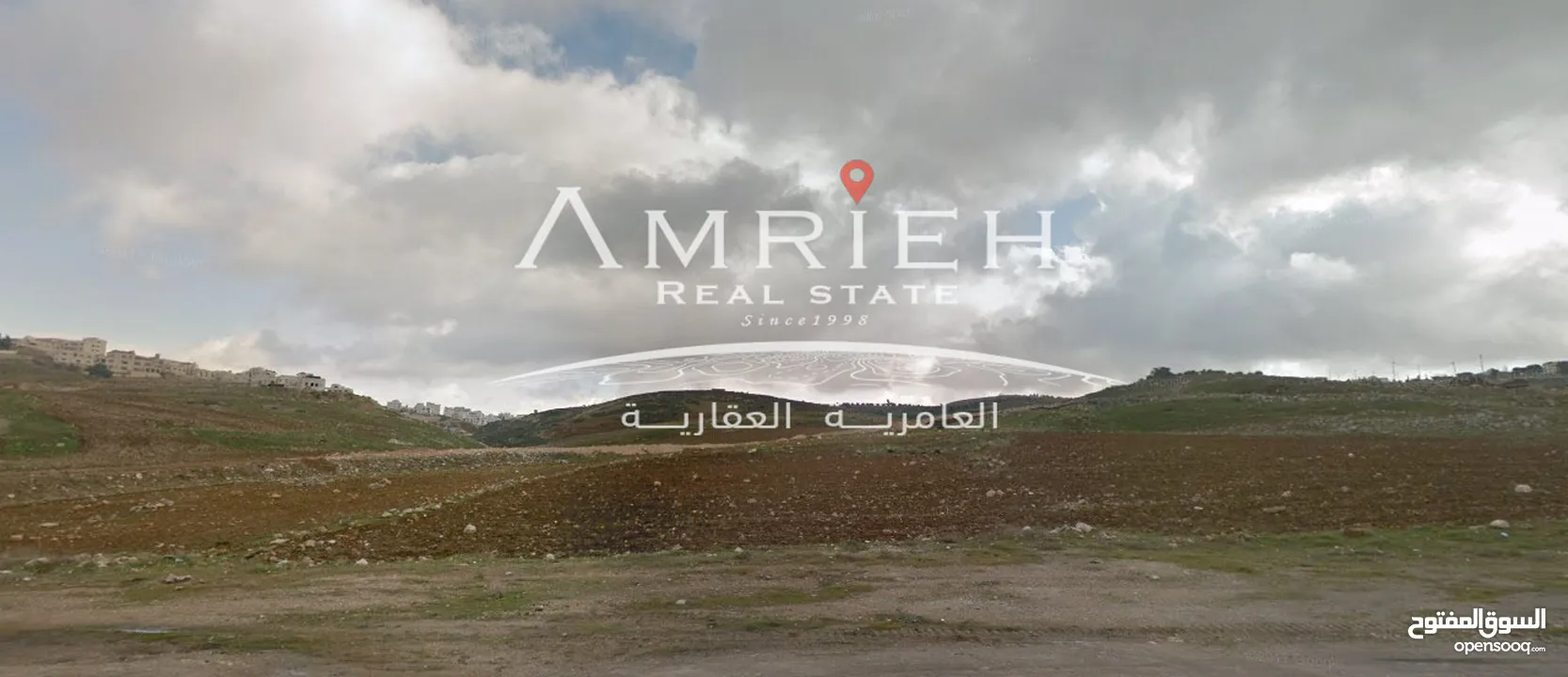 ارض 903 م للبيع في رجم عميش / اطلاله على كاريدور عبدون ( بالعالي ) .