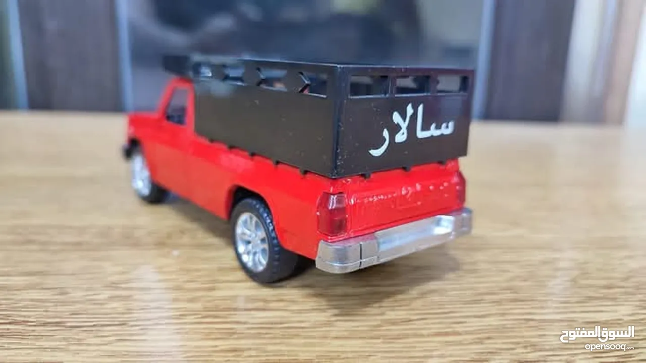 مجسم بكم جونيور حديد قياس 1/32 بفتح ابواب وكاله
