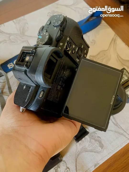 ‏Sony a7ii with Canon 50mm lens and adapter (Canon lens) ‏ Original batteries and charger 2