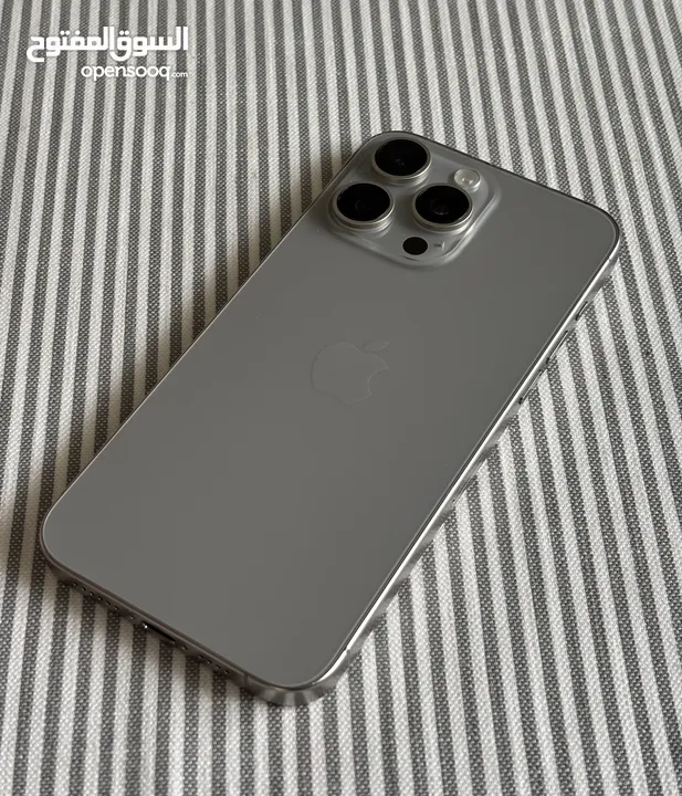iPhone 15 pro natural titanium 256GB used like new