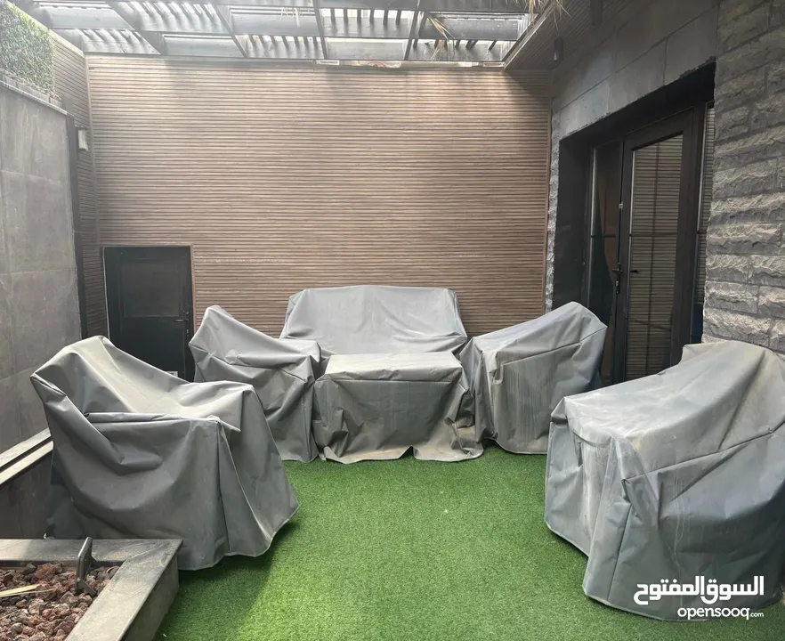 طقم حدائق خارجي 7 مقاعد مع طاولة وسط خشب زيتون مع طقم كفرات ووتر بروڤ