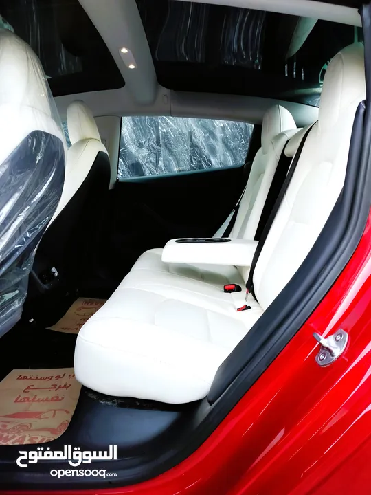 تيسلا 2022 model 3 فحص كامل 4 جــيـــد بدون ملاحظات غرفة جلد ابيض لون مميز بحالة الوكالة بسعر لقطة