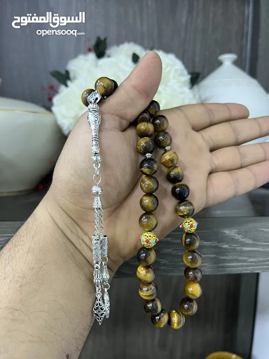 عرض خاص سبحه عين النمر ازرق او ذهبي بسعر حرق 33 حبة حلوة مش صغيرة للعلم مع طقم انتيومون مرتب