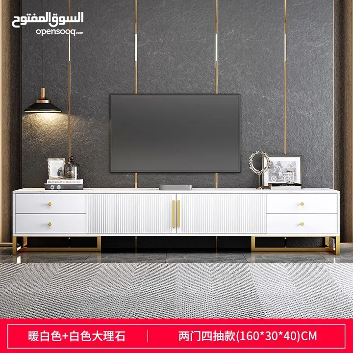 خزانة تلفزيون خشبية بشكل عصري لون ابيض و ذهبي بجرارات جانبية و خزانات  المقاس     160*30*40سم