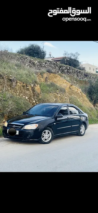 كيا سيراتو 2006 بنزين سياره بالصلاه على النبي مش ناقصها اشي ..............