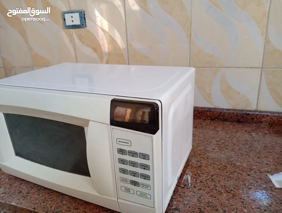 مكيرويف بحاله جديده وممتازه استعمال قليل
