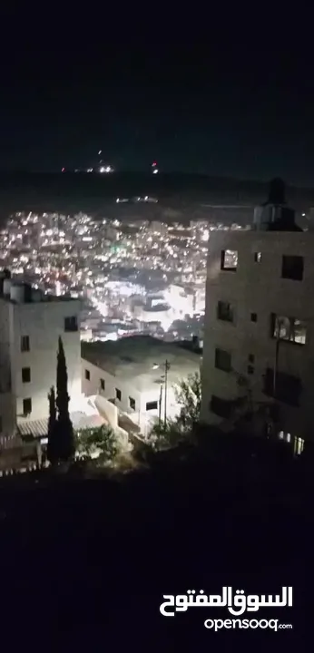 شقة مشطبة للبيع اطلالة ساحرة ع كل مدينة نابلس في دوار التعاون