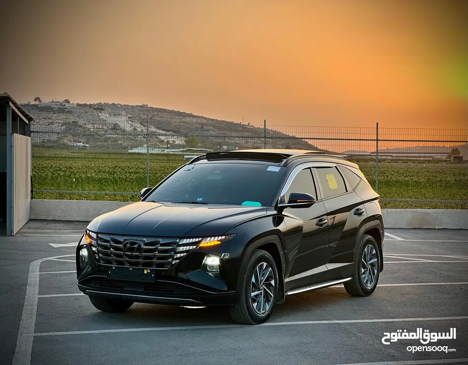 هونداي توسان/2022 فل الفل فتحة سقف بانوراما  2x4 ///240Hp بنزين + كهرباء  ( Haybrid) 1600cc