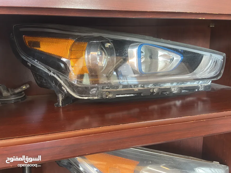 ضو امامي هونداي ايونك يمين امريكي اصلي عدسه اورنج