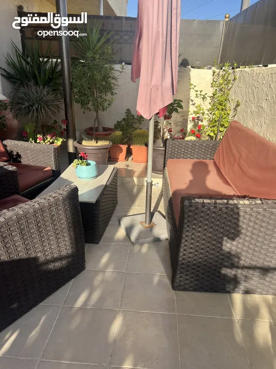 طقم راتان ومظلة ومرجيحة