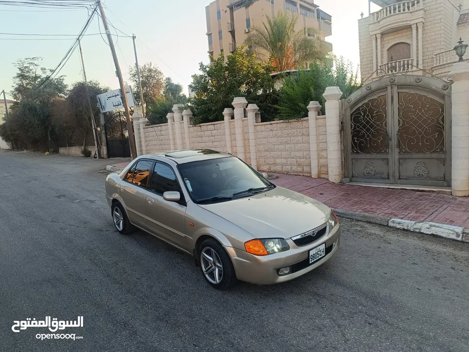 مازدا 323 اتماتك فتحه اصليه تحفه بمعنا الكلمه بسعر حرق 29500 ألف نقدا بدل وارد فحص نخب