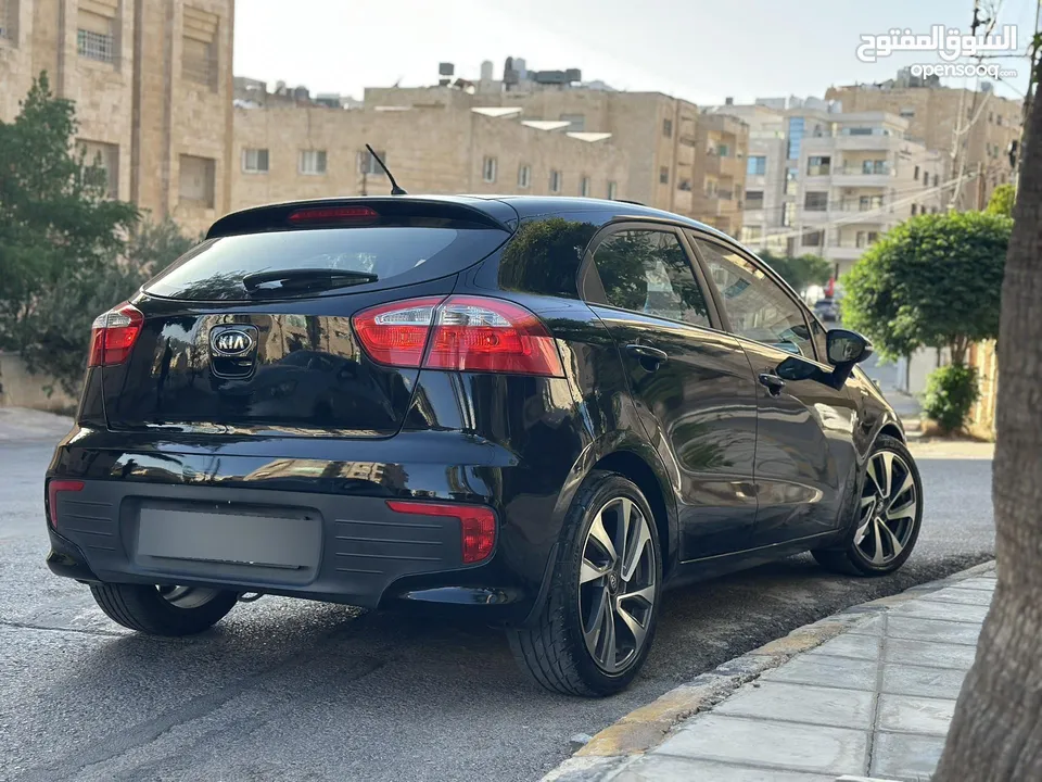 كيا ريو 2016 فل مع فتحه مميزه لون اسود نادر ومميز بالنضافه