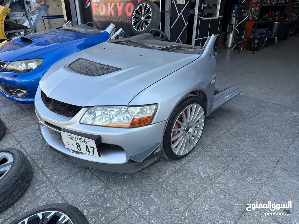 Mitsubishi Lancer Evolution 9  وارد اليابان ممشى قليل بحالة ممتازه متوفره كامله