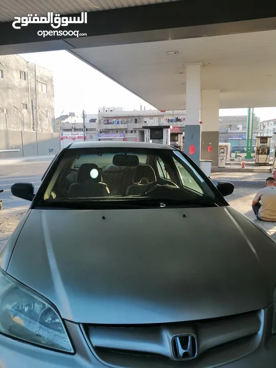 هوندا سيفيك 2004...للبيع او .....للبدل ع فورد cmax............