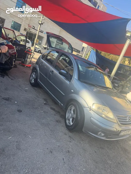 ستروين. c3.2004.1400cc..رمادي.داخلي رمادي.حاله جيده.مأمنه ومرخصه سنه