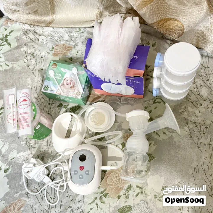 Breast pump(Juniors) and Diaper Changing Table with Freebies