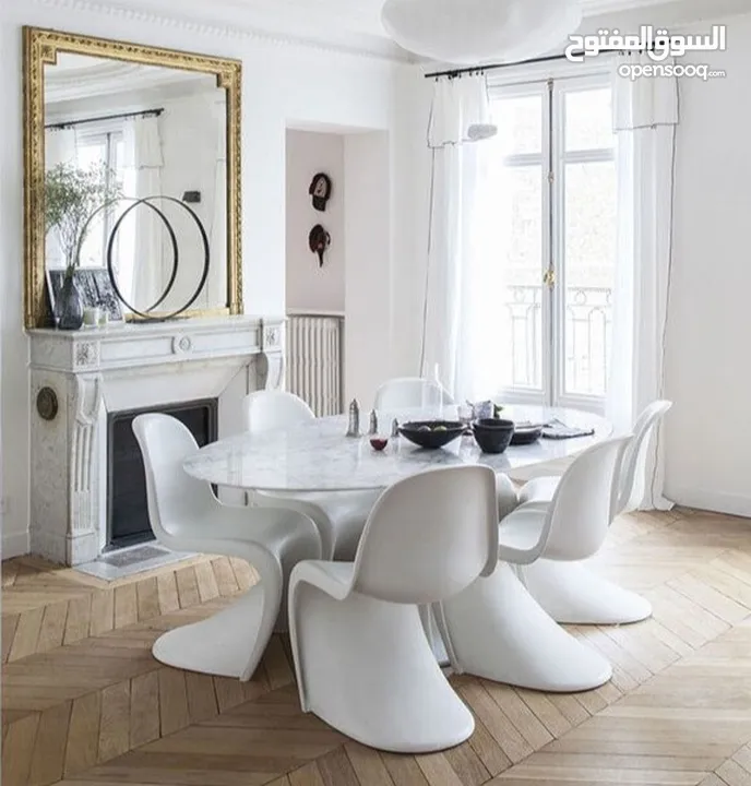 4 White Authentic Verner Panton (by Vitra) Chairs.