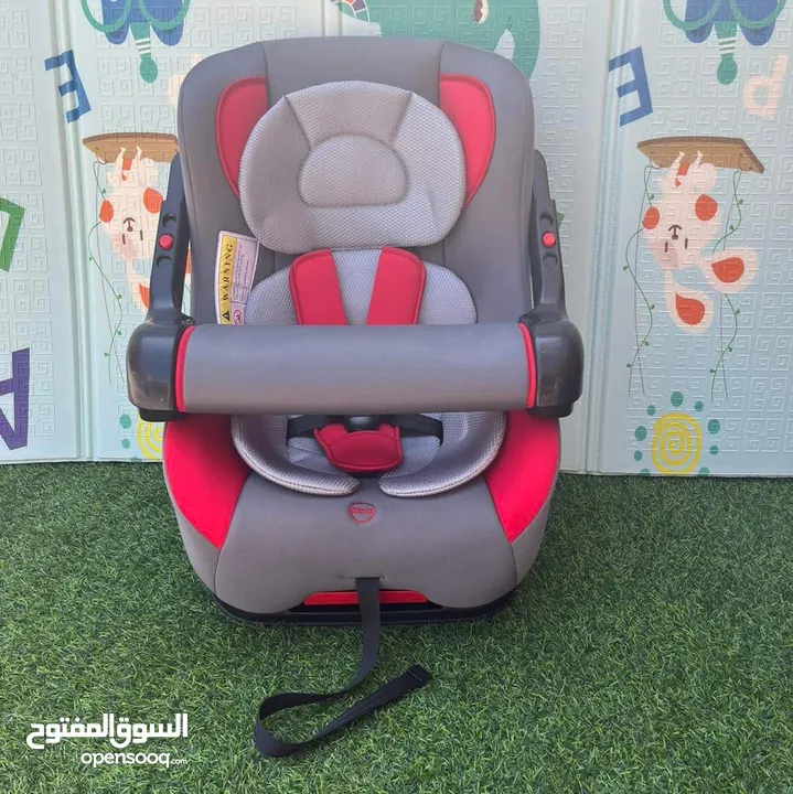 كرسي سياره للاطفال من عمر اشهر لغايه 4 سنوات مع حزامات امان وحاجز يمكن فكه