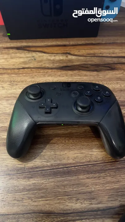 جهاز Nintendo switch استعمال بنت بحالة ممتازة مع pro controller واكسسوارات