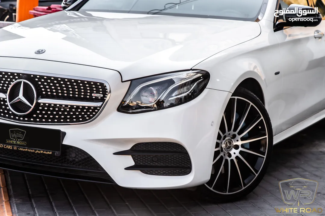 Mercedes E350e Plug in hybrid Amg kit Night Package 2018   السيارة وارد الشركة و قطعت مسافة 50,000
