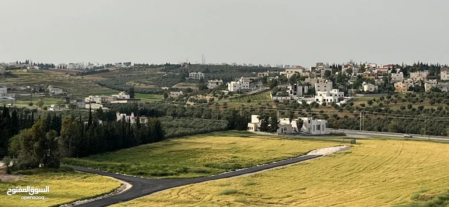 ارض سكنية  للبيع طريق المطار بالقرب من فلل جرين لاند بمساحة ( 1801 م ) في ناعور