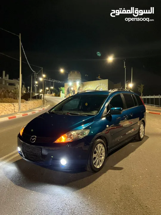 مازدا 5 جير عادي 6+1 متور 2000 بنزين رخصه و تامين جديد  عداد قليل فحص نخبب سعرر كااششش