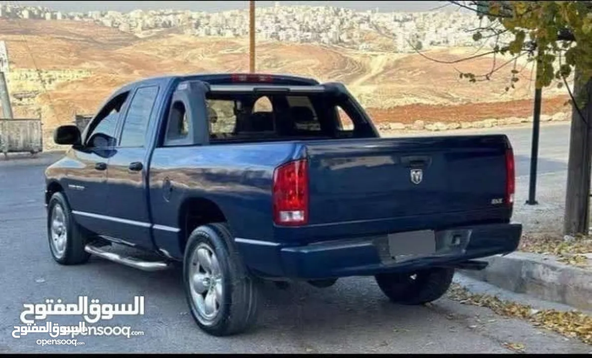 دودج رام 2005 فل الفل ما شاء الله عليه لون ازرق ، هيمي 6 ركاب ماتور 5700 فحص 4 جيد ضربات خفيفة بودي