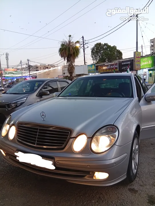 مرسيدس للبدل على احدث e200 كرت ابيض 2004