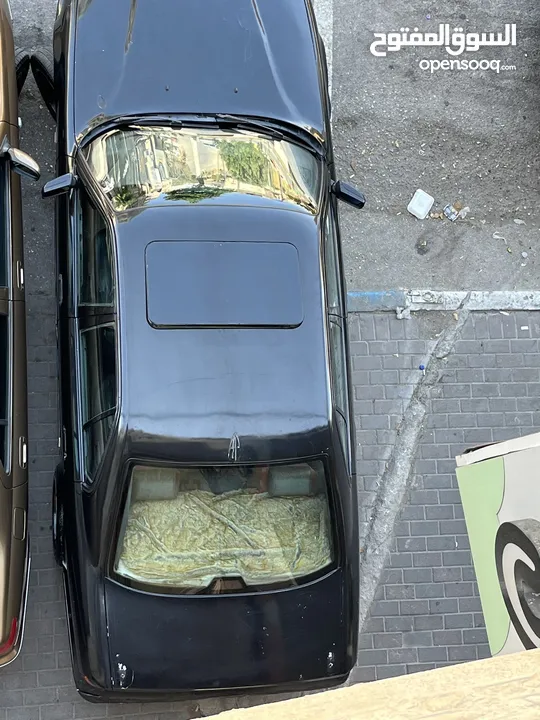 E34 BMW   اسود 6 سلندر