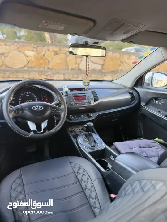 سبورتاج ديزل ماتور 2000 اتومات 4*4 اصل برايفت فحص ممتاز