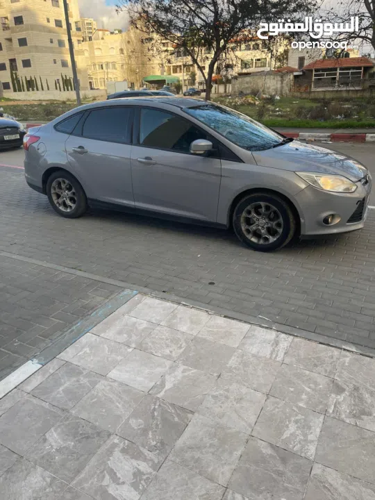 فورد فوكس ترخيص 2013 اوتوماتيك اصل الماني دفعه 15 والباقي شيكات