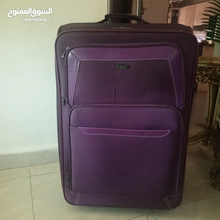 شنتة سفر جر لون بنفسجي غامق حجم كبير