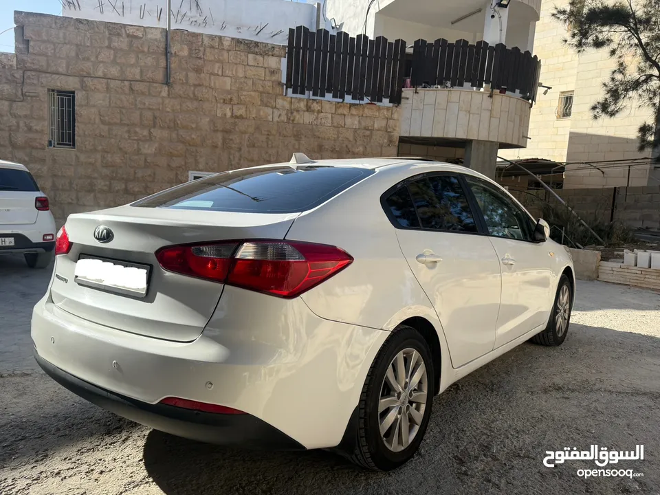 كيا k3 سيراتو 2014 مع فتحة سقف نخب بنزين
