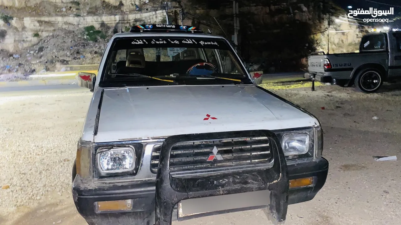 مستبيشي 1998 L200 لون ابيض للبيع اقساط دفعه 1000بحاجت ترخيص منتهي 6اشهر للستفسار
