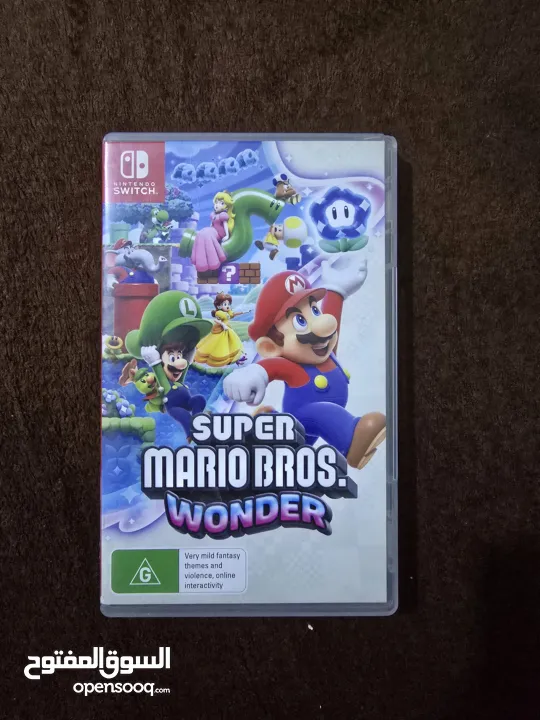 نينتندو سويتش مع 5 العاب super mario party و super mario wonder و super mario 3d world و ايد وكنترول