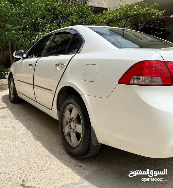 كيا اوبتما لوتسي 2009 لون ابيض بحالة جيدة جدا