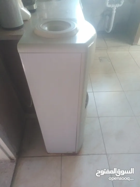 كولر ماء و فرامة لحمة مستعمل وبحالة جديدة