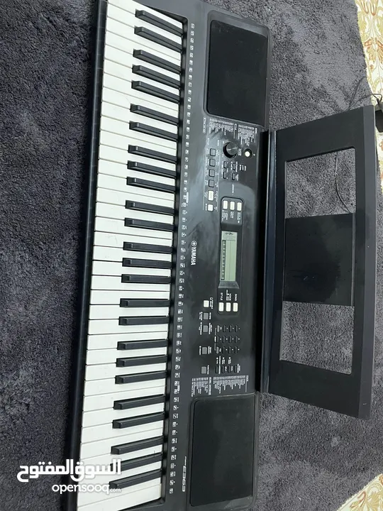 Yamaha PSR-E363 with power adaptor and holder