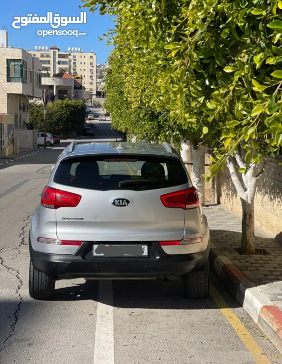 كيا سبورتاج فل الفل ما عدا فتحه ترخيص 2014  الجيب بوضع الشركة