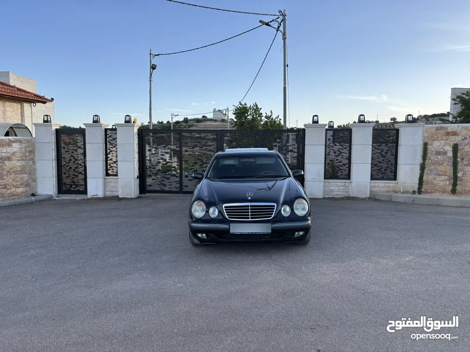 E200. 2002  قرش ونص 2002  رقم الهاتف بالوصف