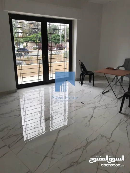 شقة أرضية فاخرة للبيع في الجندويل  - مقابل أسواق السلام 130م مع ترس 30م لم تسكن