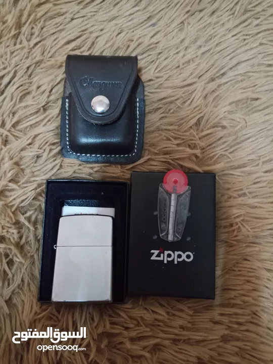 قداحة وولاعة Zippo lighter USA الامريكية الاصلية مستعملة بحالة ممتازة شبه جديدة  مع حافظة جلد اصلي .