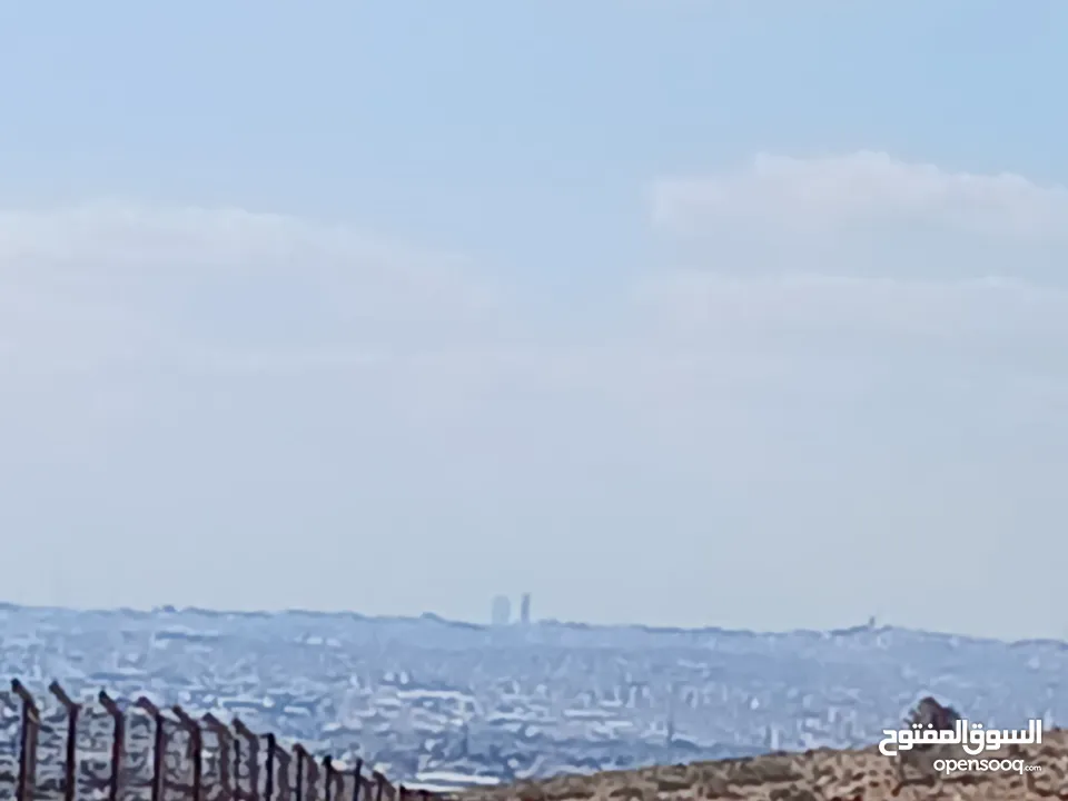 أرض مميزة في الموقر (مطل الحاتمية)