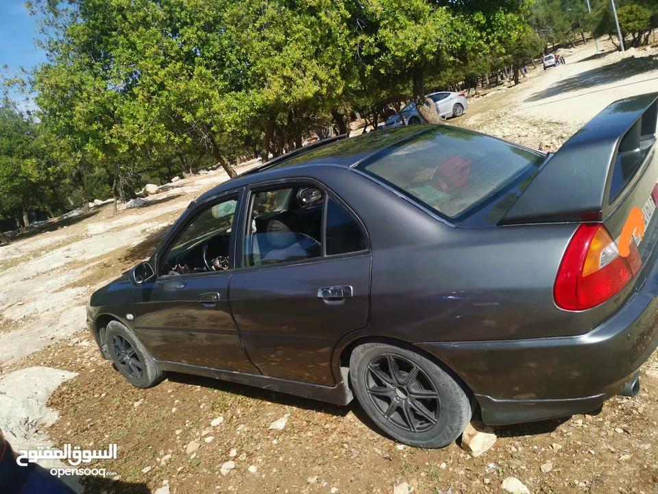 لانسر موديل  99 توماتيك وارد  خليجي ماتور 1500دبل كام شفت اللي ناوي ما بقصر معه بعيد عن تجار